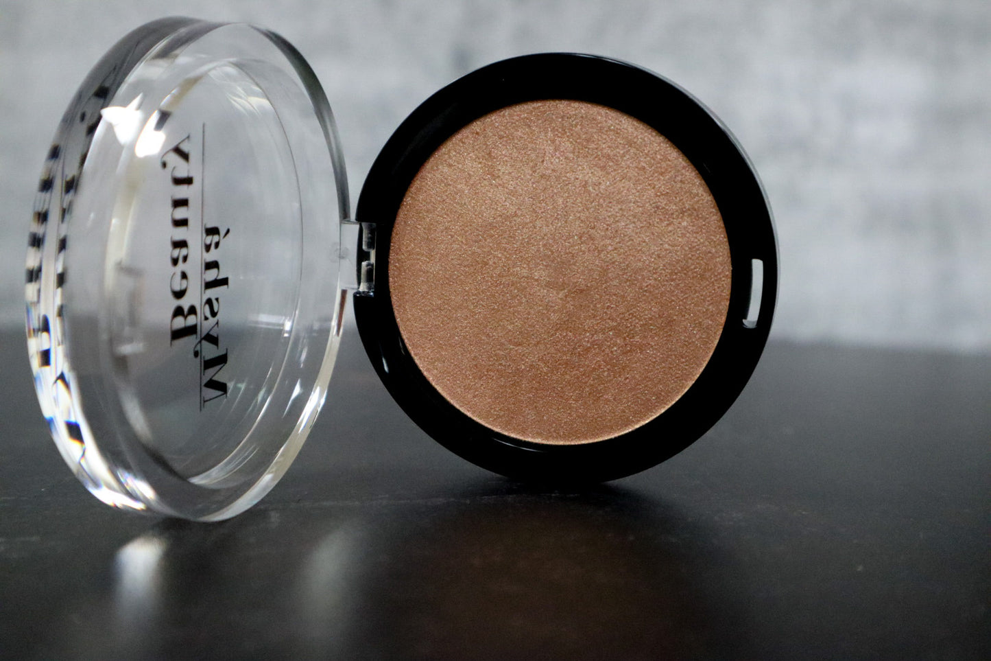 Lit highlighting powder