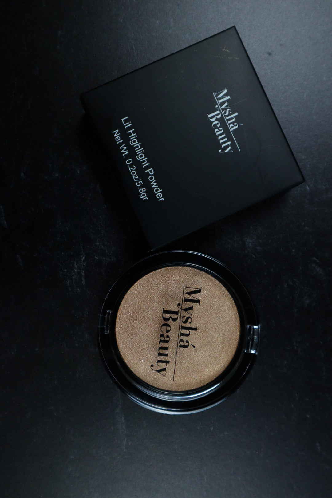 Lit highlighting powder