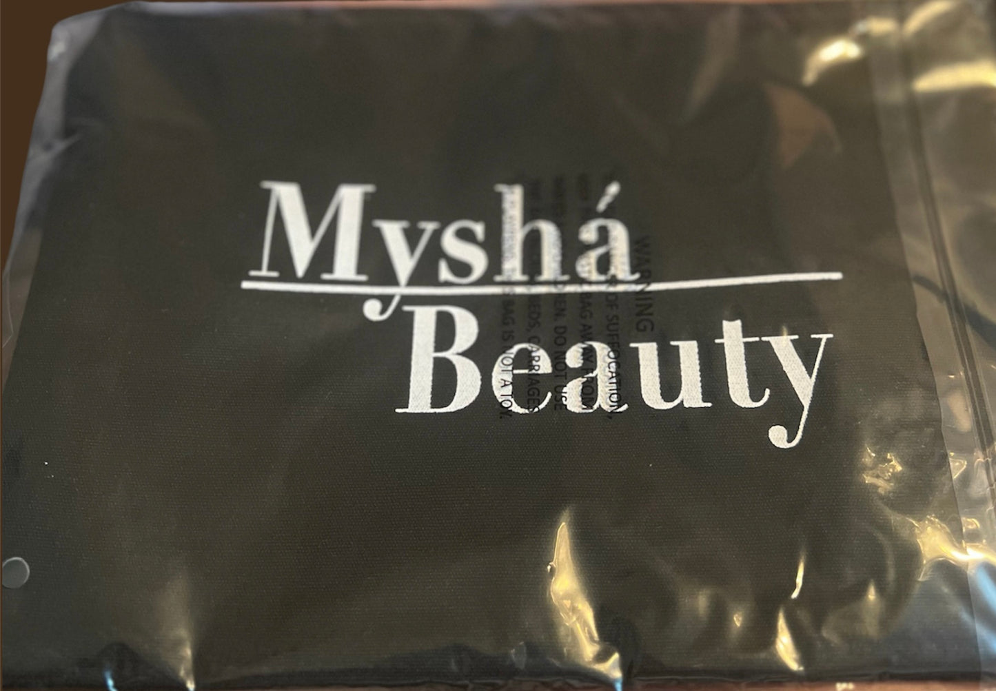 Myshá Beauty makeup bag- add this to cart if you spend $70.00 or more and get it FREE